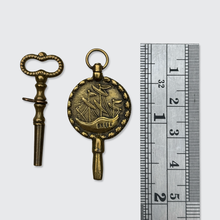 Load image into Gallery viewer, Two Antique Brass Watch Key Pendants