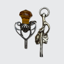 Load image into Gallery viewer, Two Silver Watch Key Pendants, including a Scottish Thistle