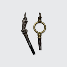 Load image into Gallery viewer, Two Antique Watch Key Pendants, including a Pistol