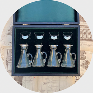 Set of Four Whiskey Noggin Jugs with Sterling Silver Fittings in Box, 1912