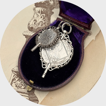 Load image into Gallery viewer, Two Silver Coin-Shaped Watch Key Pendants