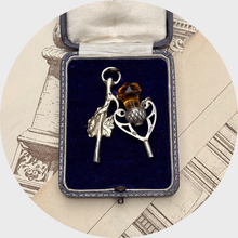 Load image into Gallery viewer, Two Silver Watch Key Pendants, including a Scottish Thistle