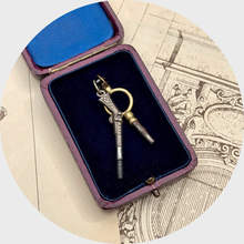 Load image into Gallery viewer, Two Antique Watch Key Pendants, including a Pistol
