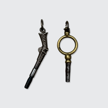 Load image into Gallery viewer, Two Antique Watch Key Pendants, including a Pistol