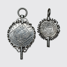 Load image into Gallery viewer, Two Silver Coin-Shaped Watch Key Pendants