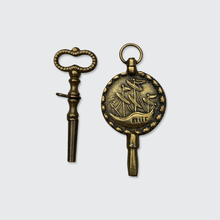 Load image into Gallery viewer, Two Antique Brass Watch Key Pendants